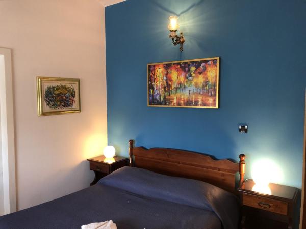 Family Rooms Sabrina : photo 6 de la chambre chambre quadruple avec salle de bains privative