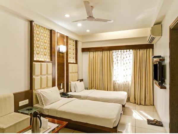 Atithi The Hotel : photo 3 de la chambre chambre deluxe double ou lits jumeaux
