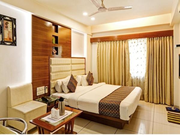 Atithi The Hotel : photo 2 de la chambre chambre deluxe double ou lits jumeaux