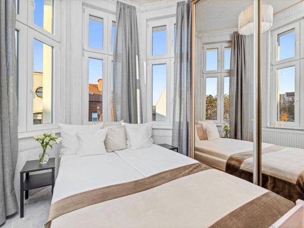 Riviera Residence Apartments : photo 5 de la chambre appartement 2 chambres avec salon