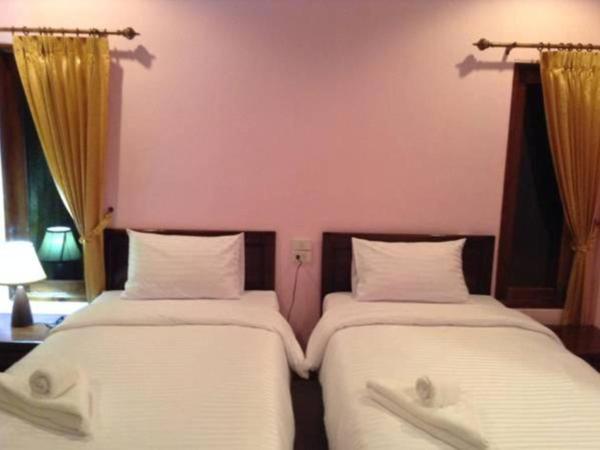 Lanta Cottage - SHA Plus : photo 4 de la chambre chambre double ou lits jumeaux deluxe - vue sur piscine