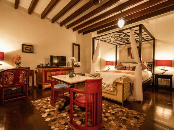 Hotel Penaga : photo 5 de la chambre chambre lit king-size hutton deluxe avec jacuzzi et balcon