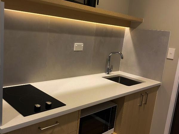 Takapuna International Motor Lodge : photo 8 de la chambre studio lit queen-size de luxe 