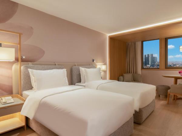 Mövenpick Hotel Istanbul Bosphorus : photo 3 de la chambre chambre lits jumeaux supérieure - vue sur ville