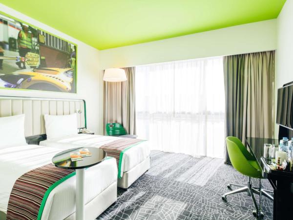 Park Inn by Radisson Dubai Motor City : photo 1 de la chambre chambre double ou lits jumeaux standard