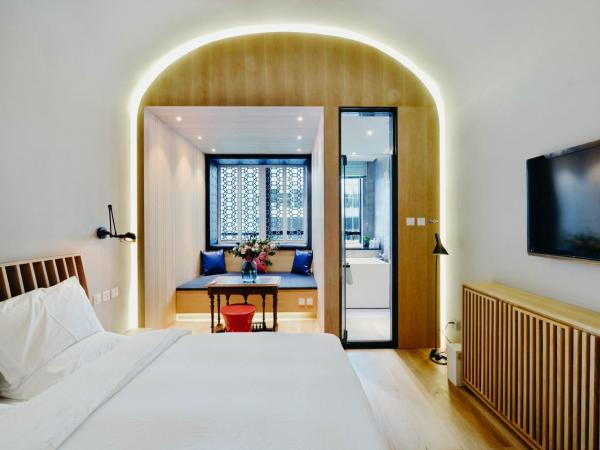 7Shang : photo 1 de la chambre chambre supérieure lit queen-size