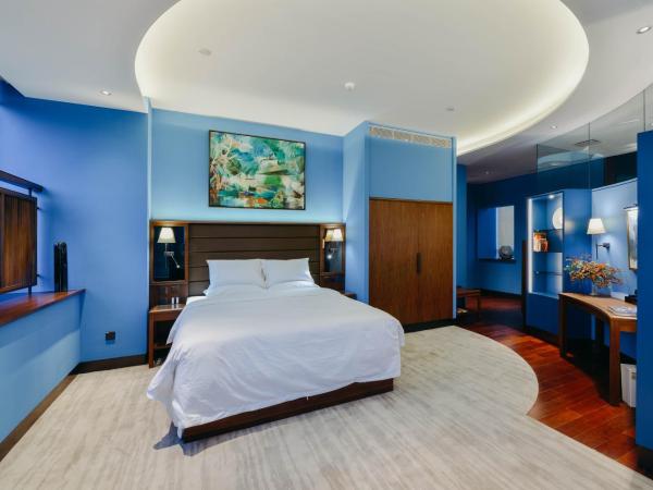 7Shang : photo 6 de la chambre chambre lit king-size - vue sur jardin