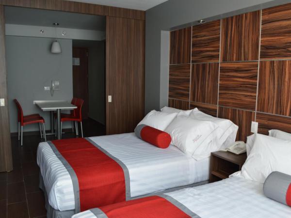 Hotel Block Suites : photo 8 de la chambre suite double standard avec 2 lits doubles