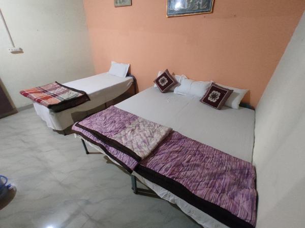 Superinn home stay& guest house : photo 3 de la chambre chambre triple basique