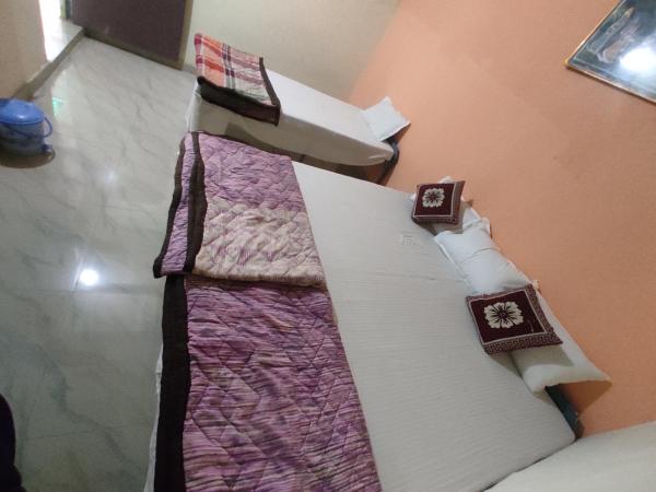 Superinn home stay& guest house : photo 2 de la chambre chambre triple basique