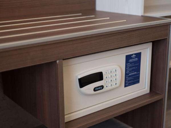 Microtel Inn & Suites by Wyndham Guadalajara Sur : photo 1 de la chambre chambre lit queen-size accessible aux personnes à mobilité réduite - non-fumeurs