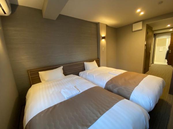 C＆Jホテル : photo 6 de la chambre chambre lits jumeaux deluxe