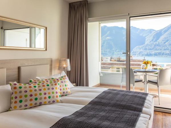 Smart-HOTEL MINUSIO, a Benvenuti Hotel : photo 3 de la chambre chambre double avec balcon – vue sur lac