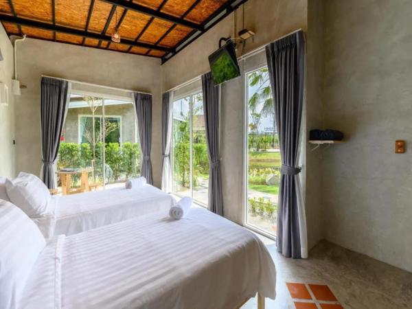 Loftpical Resort : photo 7 de la chambre chambre lits jumeaux