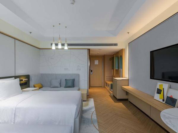 Holiday Inn Chongqing Guanyinqiao, an IHG Hotel : photo 4 de la chambre chambre double standard avec 2 lits doubles - vue sur ville