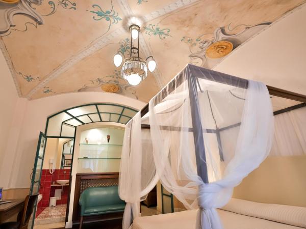 Kriò Suite : photo 2 de la chambre suite lit king-size avec balcon