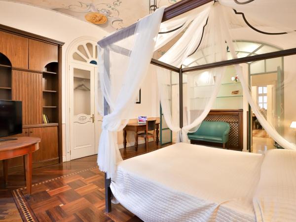 Kriò Suite : photo 5 de la chambre suite lit king-size avec balcon