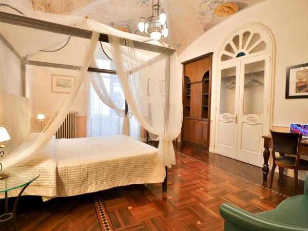 Kriò Suite : photo 1 de la chambre suite lit king-size avec balcon