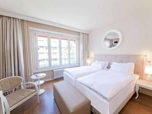 Geneva By Fassbind : photo 2 de la chambre chambre double ou lits jumeaux
