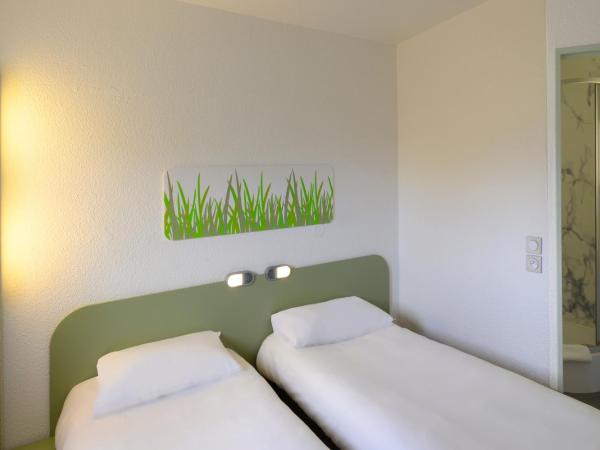 Ibis budget Saint-Étienne stade : photo 9 de la chambre chambre lits jumeaux standard