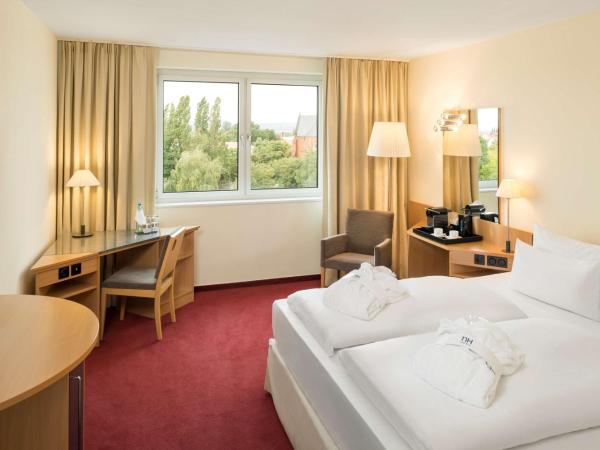 NH Dresden Neustadt : photo 1 de la chambre chambre lits jumeaux supérieure