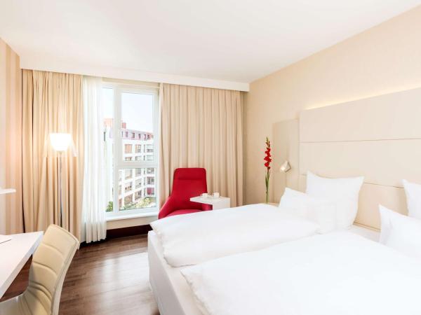 NH Collection Nürnberg City : photo 1 de la chambre chambre double ou lits jumeaux premium