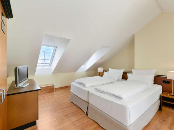 NH München City Süd : photo 3 de la chambre chambre familiale quadruple