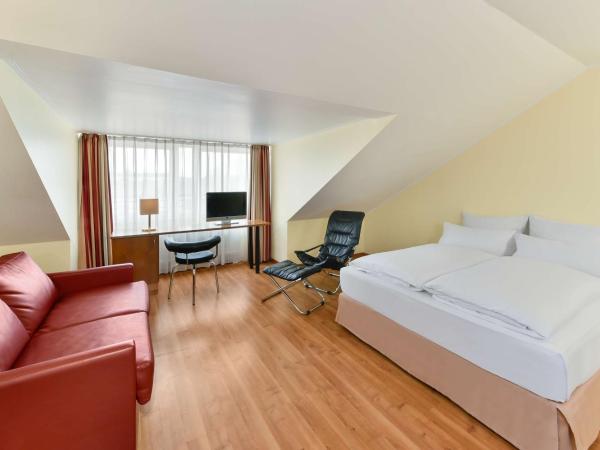 NH München City Süd : photo 6 de la chambre chambre familiale quadruple