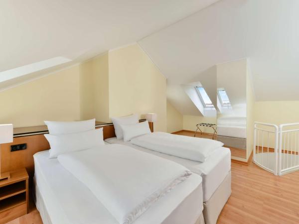 NH München City Süd : photo 4 de la chambre chambre familiale quadruple