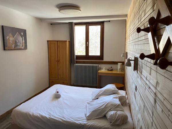 Les Carlines : photo 3 de la chambre chambre double ou lits jumeaux standard