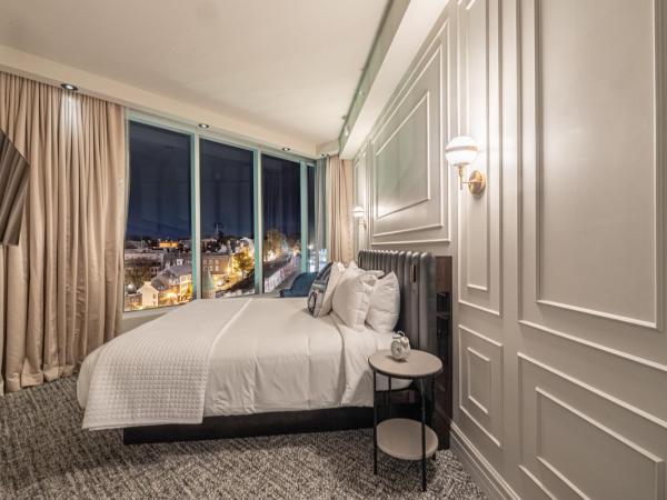 Le Capitole Hotel : photo 3 de la chambre suite deluxe avec lit king-size