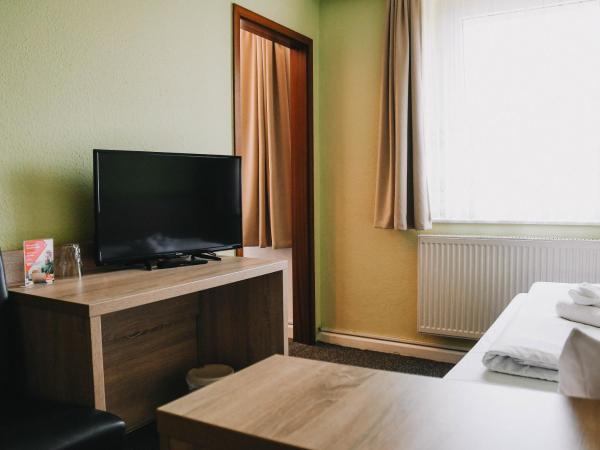 Hotel-Pension ODIN : photo 1 de la chambre chambre simple avec salle de bains privative