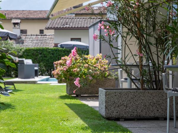 Smart-HOTEL MINUSIO, a Benvenuti Hotel : photo 4 de la chambre chambre double avec jardin