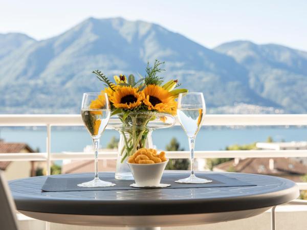 Smart-HOTEL MINUSIO, a Benvenuti Hotel : photo 5 de la chambre chambre double avec balcon – vue sur lac