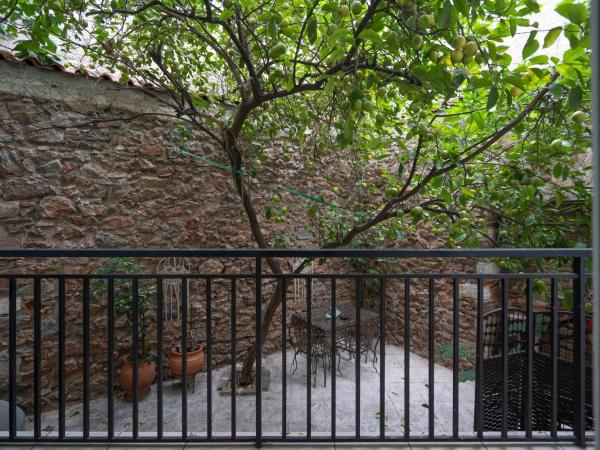 Lamda Vintage Appartment : photo 9 de la chambre studio avec vue sur jardin