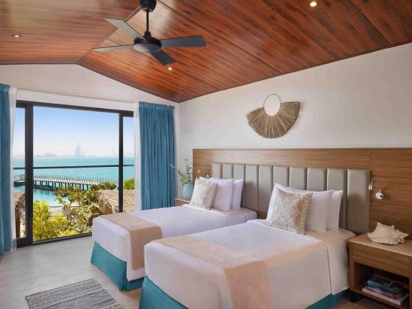 Anantara World Islands Dubai Resort : photo 1 de la chambre chambre lit king-size ou lits jumeaux - vue sur océan