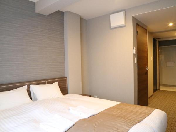 C＆Jホテル : photo 10 de la chambre chambre lits jumeaux