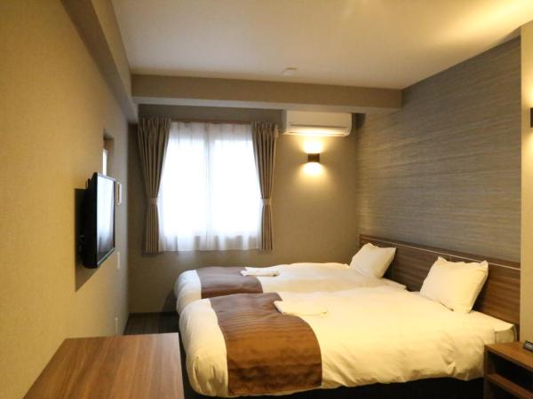 C＆Jホテル : photo 10 de la chambre chambre lits jumeaux deluxe