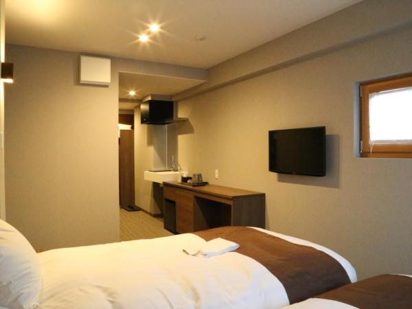 C＆Jホテル : photo 7 de la chambre chambre lits jumeaux deluxe