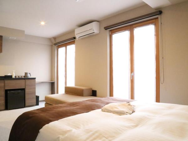 C＆Jホテル : photo 7 de la chambre suite deluxe avec lit king-size