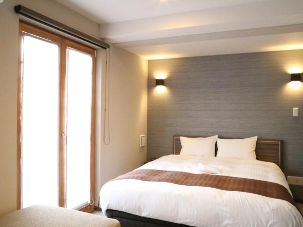 C＆Jホテル : photo 9 de la chambre suite deluxe avec lit king-size