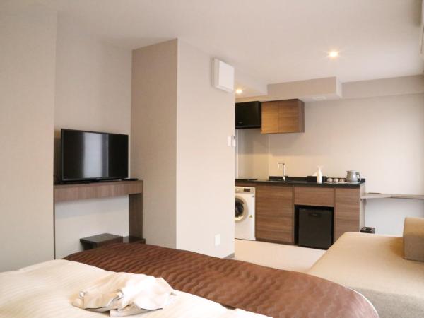 C＆Jホテル : photo 8 de la chambre suite deluxe avec lit king-size