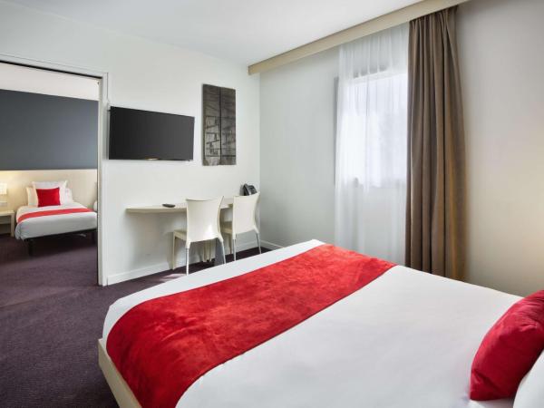 Sure Hotel by Best Western Nantes Beaujoire : photo 1 de la chambre chambre lit queen-size familiale avec 2 lits simples
