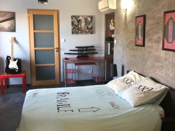 Lou Bastido : photo 1 de la chambre suite - vue sur jardin