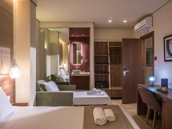 Metropole Urban Hotel : photo 5 de la chambre chambre triple - vue sur ville