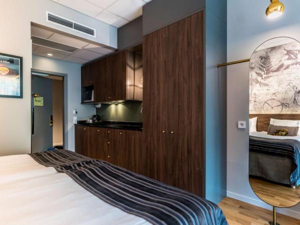 Scandic Frimurarehotellet : photo 3 de la chambre quadruple family room with kitchenette