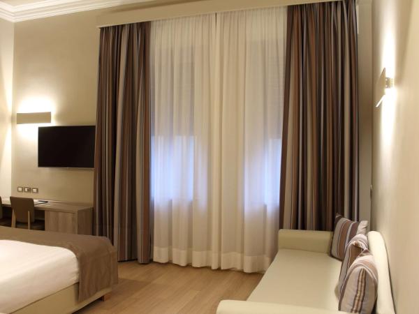 Best Western Hotel Moderno Verdi : photo 1 de la chambre chambre quadruple confort