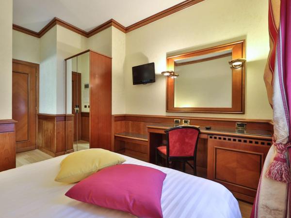Best Western Hotel Moderno Verdi : photo 1 de la chambre chambre simple avec petit lit double.