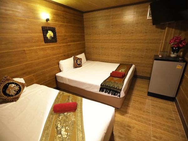 Thai Cozy House - SHA certified : photo 2 de la chambre chambre triple standard (sans fenêtre)