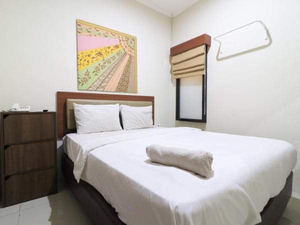 Uptown Residence Syariah Pondok Pinang : photo 1 de la chambre chambre double standard